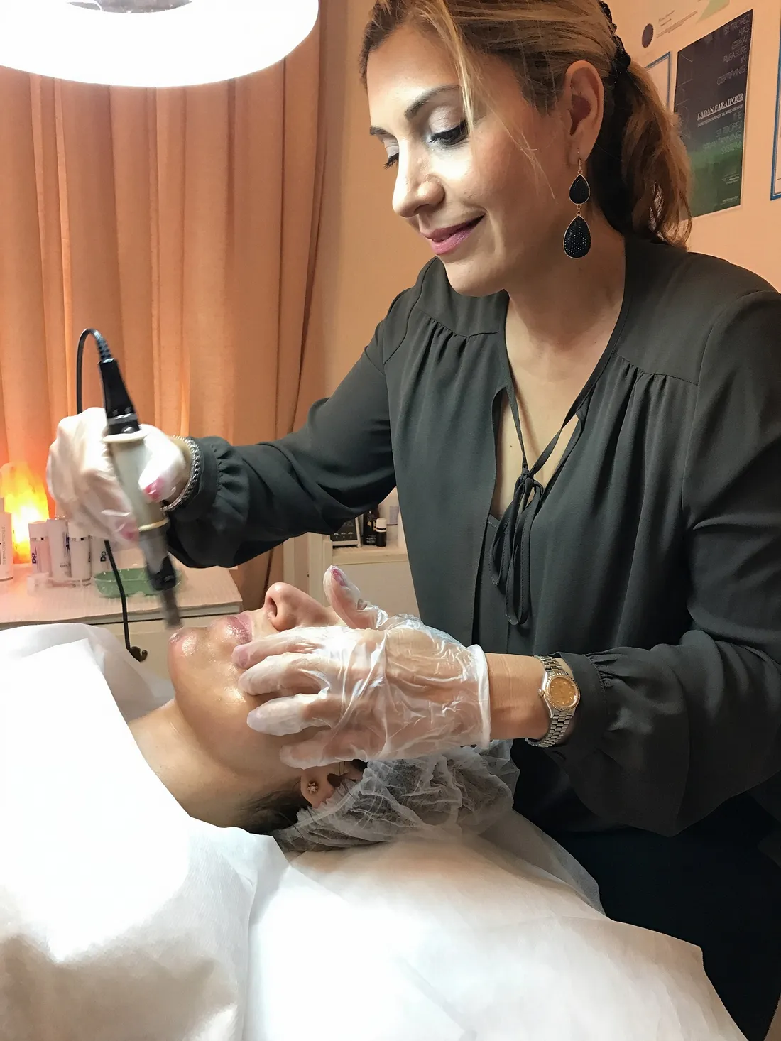 Ladan Farajpour performing a treatment in her Frenchs Forest studio